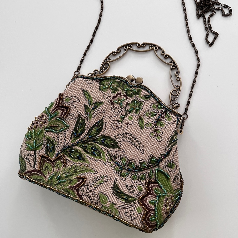 Cute and delicate little green purse
